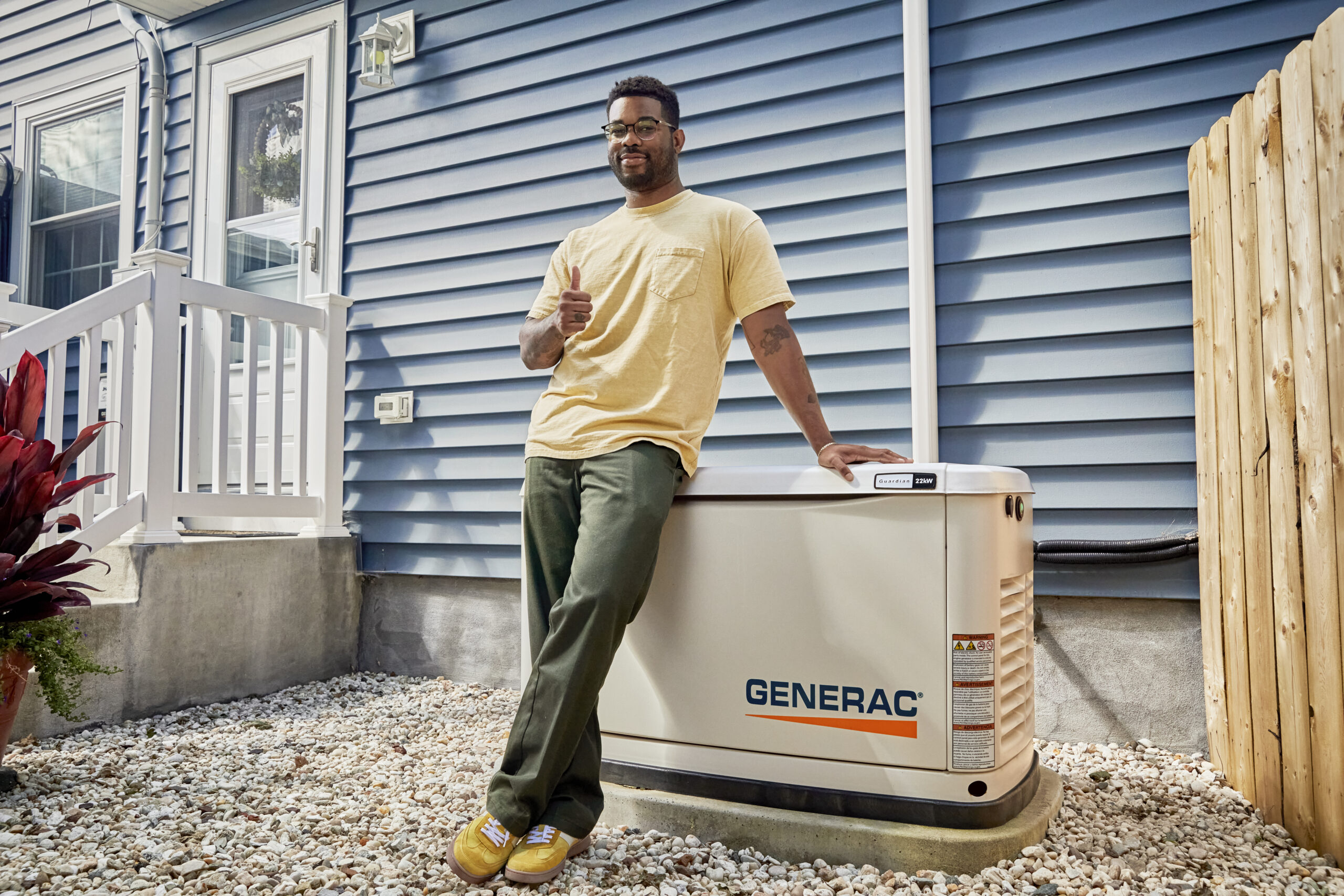 Generac generator secured in the flood zone area of a Raleigh home, installed by PowerMaster Electrics